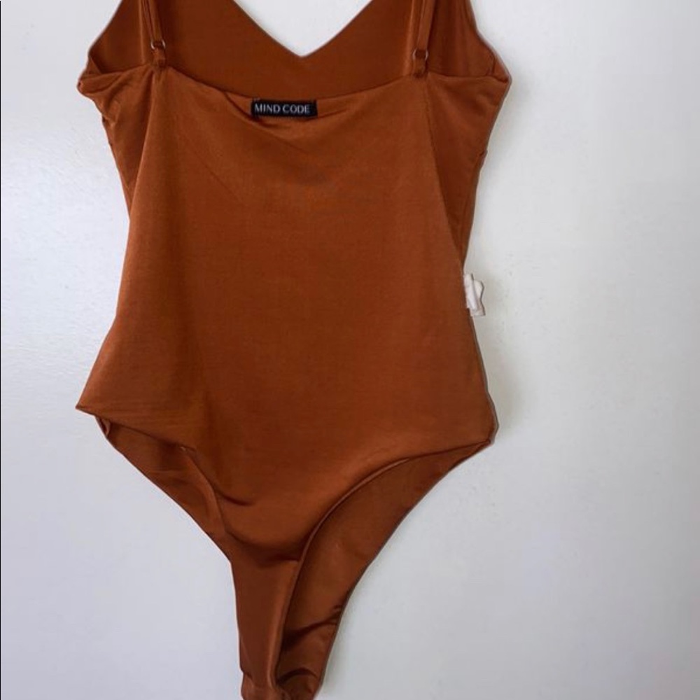Mindcode orange bodysuit